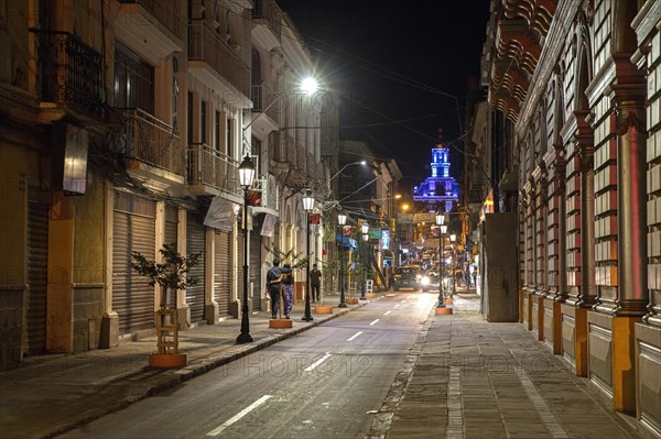 Street with colonial houses at night at Tarija