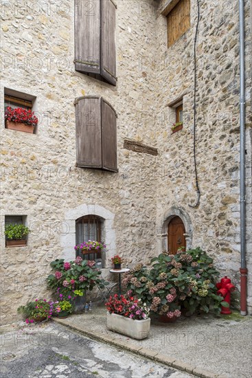 Traditional houses in alley at the village La Palud-sur-Verdon