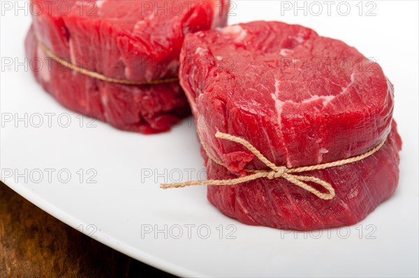 Fresh raw beef filet mignon cut ready to cook