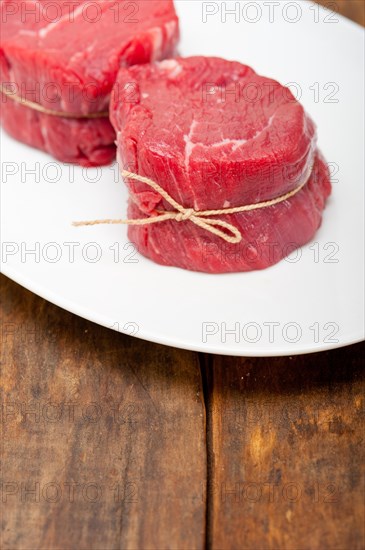 Fresh raw beef filet mignon cut ready to cook