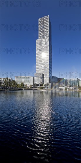 Cologne Tower reflected in the Mediapark Lake
