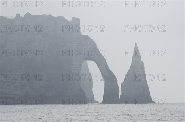 The Needle Rock and Porte d'Aval in the fog