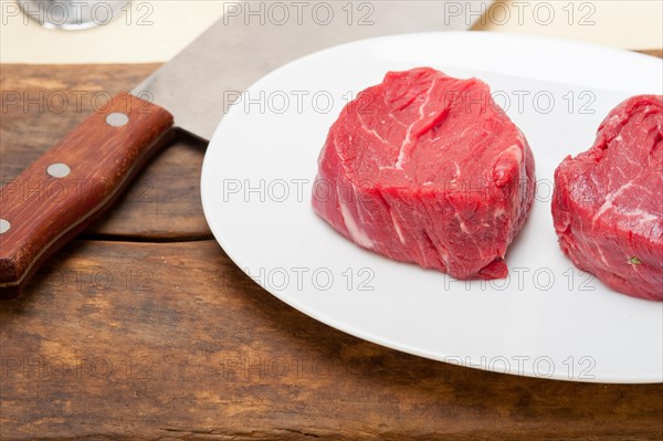 Fresh raw beef filet mignon cut ready to cook