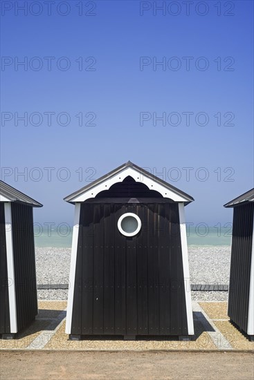 Beach cabins at seaside resort Sainte-Marguerite-sur-Mer along the North Sea coast