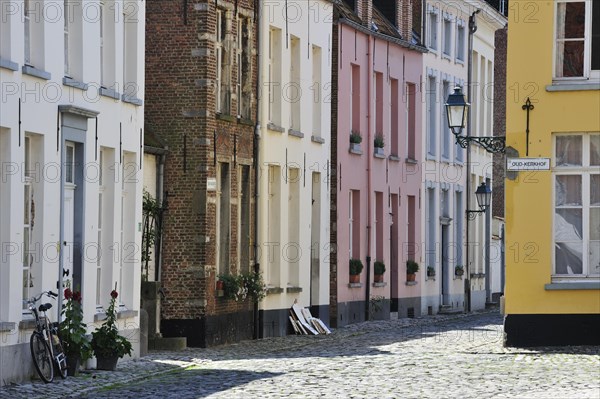 Narrow alleys with old houses of beguines in the beguinage of Lier