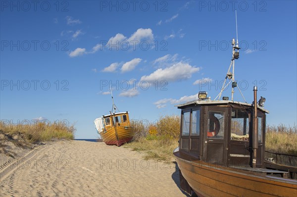 Traditional wooden fishing boats in the dunes along the Baltic Sea at Ahlbeck