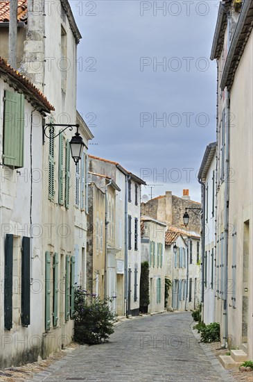 Paved alley in the village Saint-Martin-de-Re on the island Ile de Re