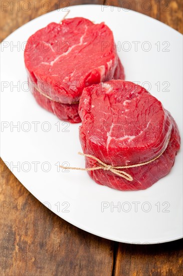 Fresh raw beef filet mignon cut ready to cook