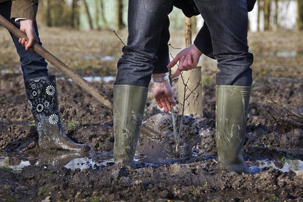 Man wearing rubber boots