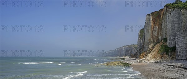 Shingle beach and chalk cliffs along the North Sea coast at Yport