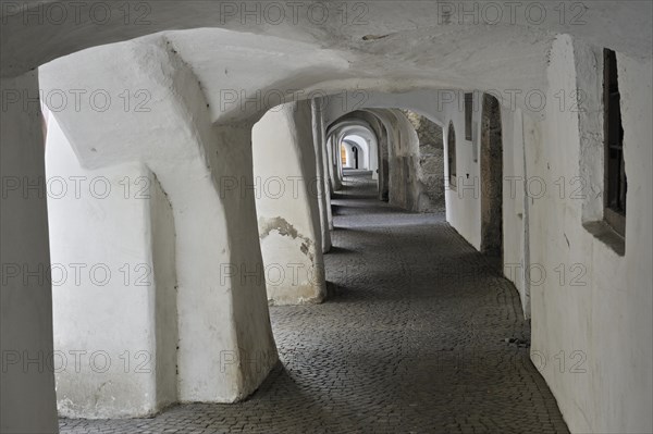 Arcade covered sidewalk pavement along the Laubengasse at Glorenza