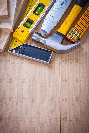 Collection of house-improvement working objects on wooden board copy space image construction concept