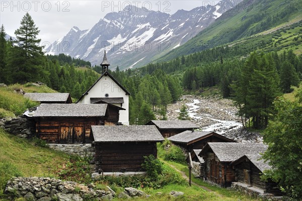 Chapel and traditional wooden chalets and granaries