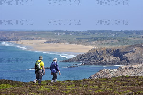 Hikers following trail along the Cap de la Chevre