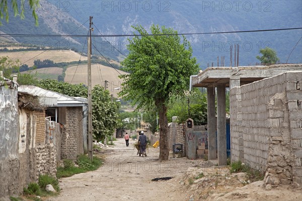 Houses along alley in a small village in rural Iran