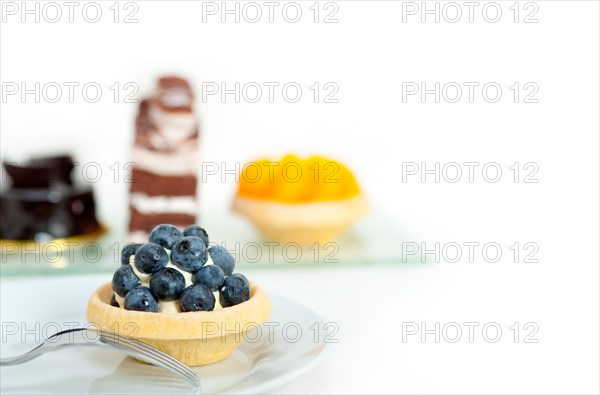 Fresh blueberry cream cupcake homemade closeup macro