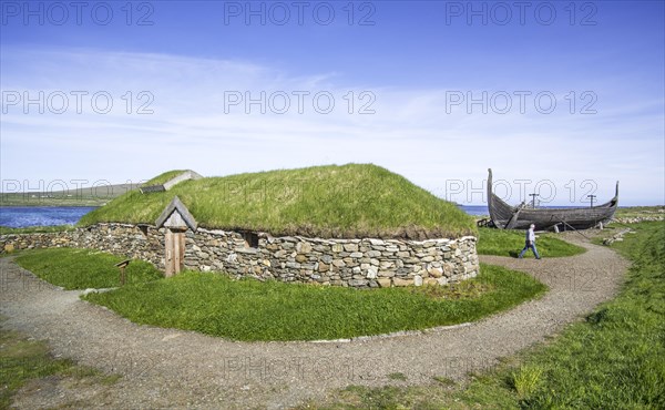 Reconstruction of Norse Viking longhouse and the Skidbladner