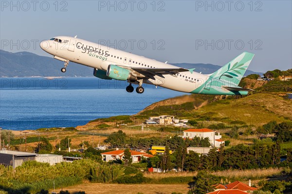 A Cyprus Airways Airbus A320 aircraft with registration 5B-DDQ at Skiathos Airport