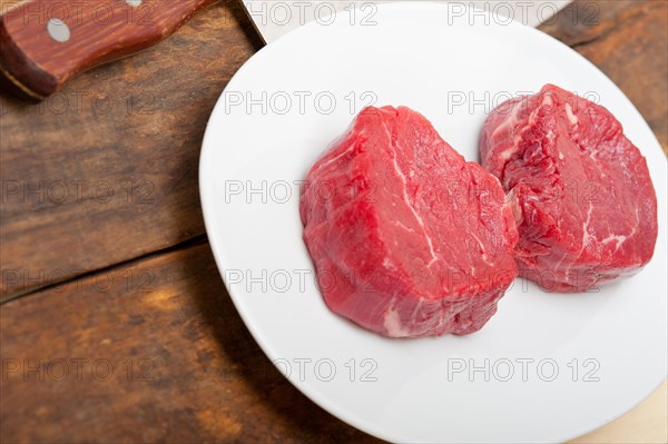 Fresh raw beef filet mignon cut ready to cook