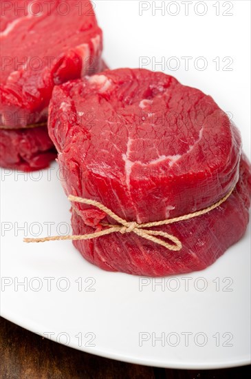 Fresh raw beef filet mignon cut ready to cook