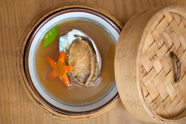 Japanese style abalone soup on bamboo bowl set holder