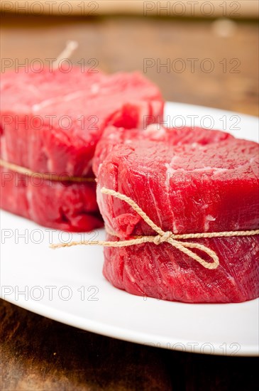 Fresh raw beef filet mignon cut ready to cook