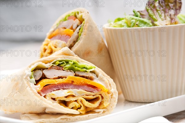 Fresh and healthy club sandwich pita bread roll