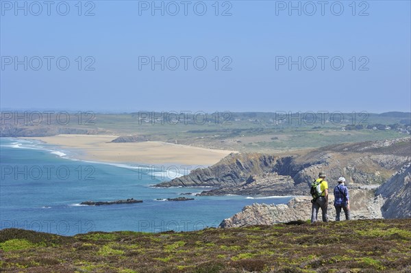 Hikers following trail along the Cap de la Chevre