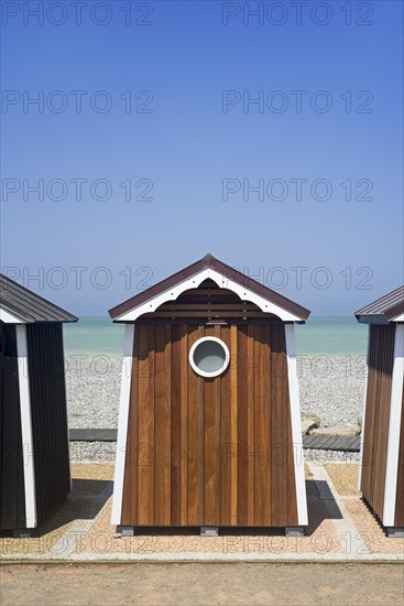 Beach cabins at seaside resort Sainte-Marguerite-sur-Mer along the North Sea coast