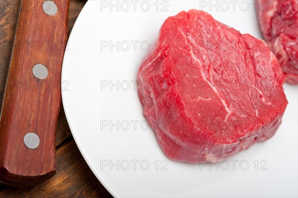 Fresh raw beef filet mignon cut ready to cook