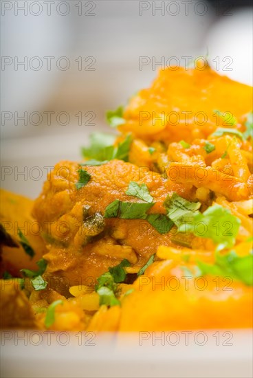 Fresh home made curry beef rice and potatoes with ingredients around composition