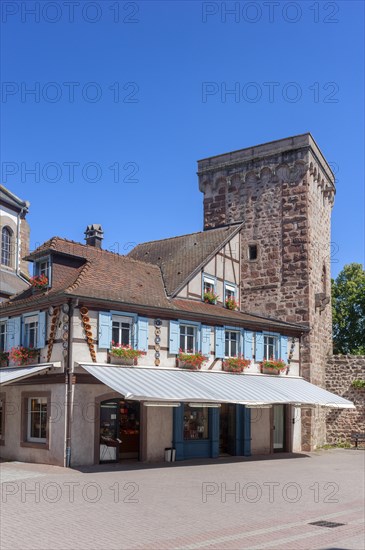 Half-timbered ensemble with historic city wall on Place Andre Neher