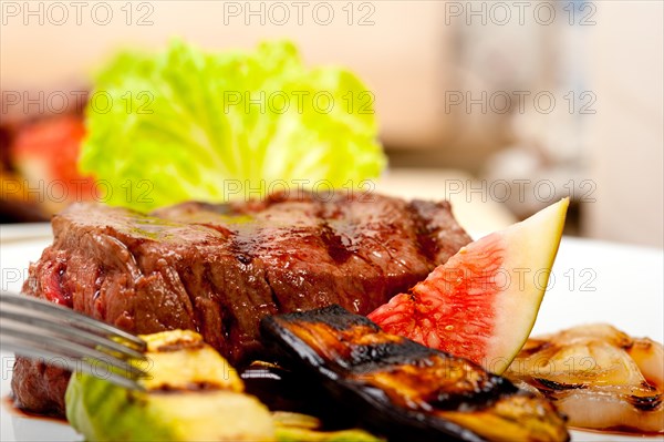 Grilled fresh beef filet mignon and vegetables