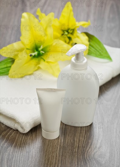 Towel tube bottle and flower