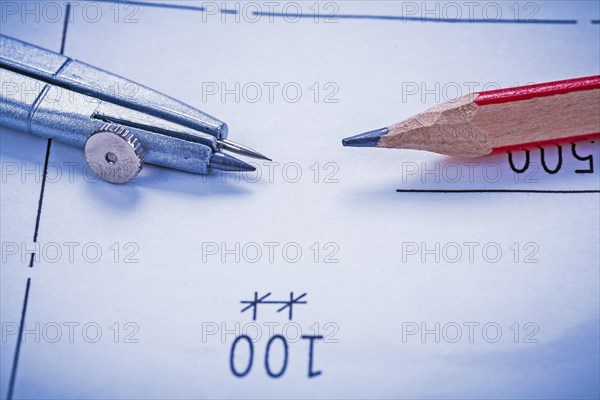 Very close view Compass and pencil learning concept