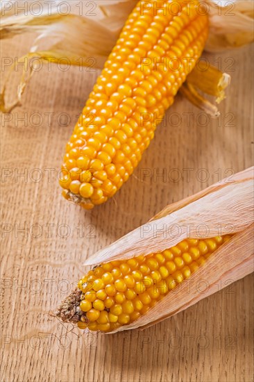 Corn on the cob on a wooden table