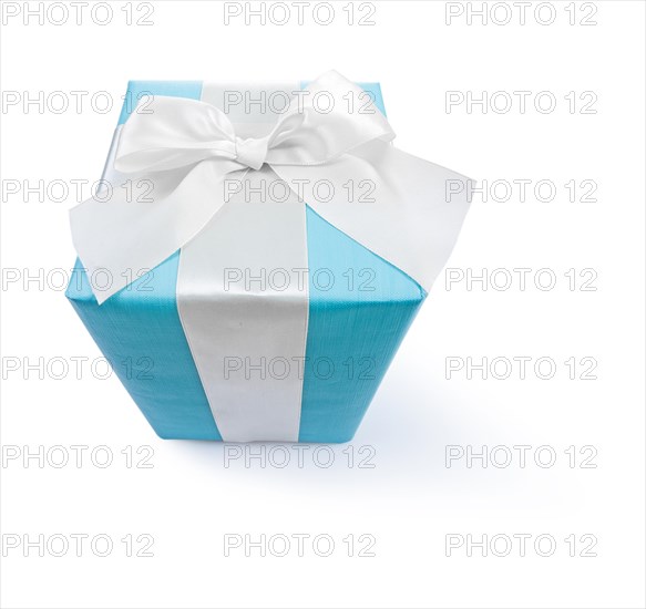 Blue gift box with white ribbon and bow against a white background