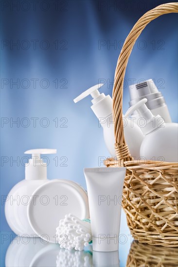 Copy room image of white care products on a blue background