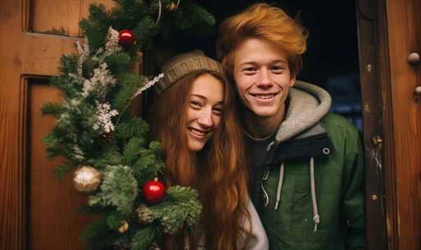 Young couple smiling together near home door decorated with mistletoe. Christmas holidays Ai generated