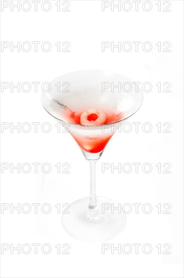 Lychee martini cocktail straight up isolated on white background