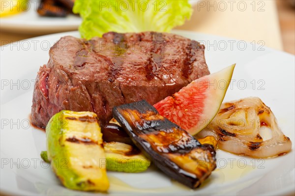 Grilled fresh beef filet mignon and vegetables