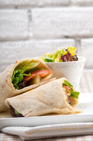 Kafta shawarma chicken pita wrap roll sandwich traditional arab mid east food