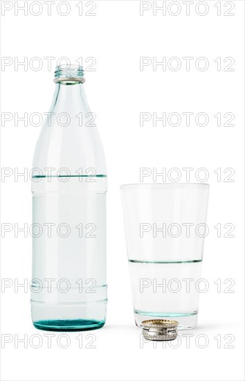 Bottle and glass with water and a cover it is isolated