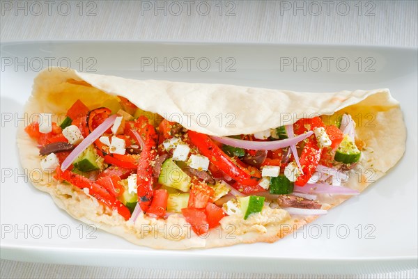 Fresh homemade salad wrap on pita bread