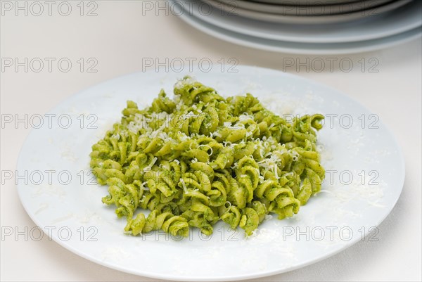 Italian fusilli pasta and fresh homemade pesto sauce