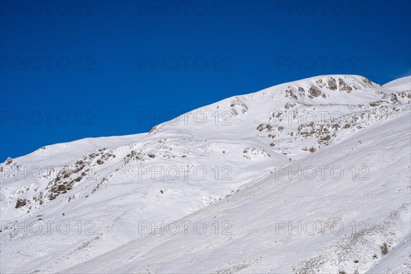 Natural landscape in the autumn with snow-capped mountains in the Cerdanya area in the province of Gerona in Catalonia in Spain