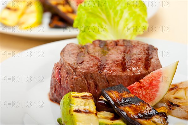 Grilled fresh beef filet mignon and vegetables