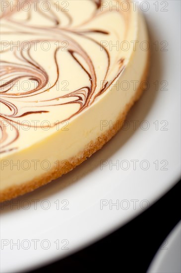 Fresh baked classic Cheese cake with chocolate topping