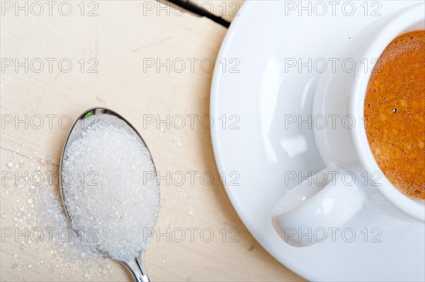 Italian espresso coffee over white wood table