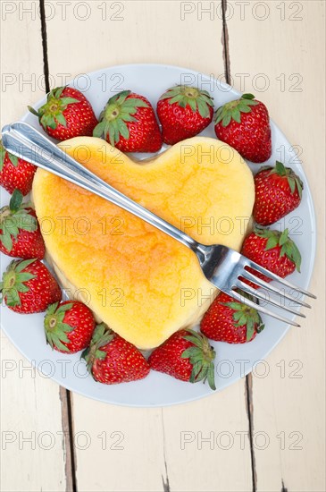 Heart shaped cheesecake with strawberryes ideal cake for valentine day